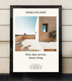 A subway billboard containing an Engel & Völkers advertisement for 'First-class service, better living'