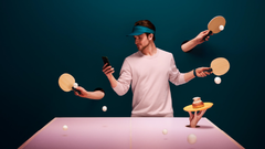 Man effortlessly returning multiple ping pong balls whilst signing contracts using Oneflow on his phone